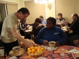 Baker with fresh bread, as we sit down for supper